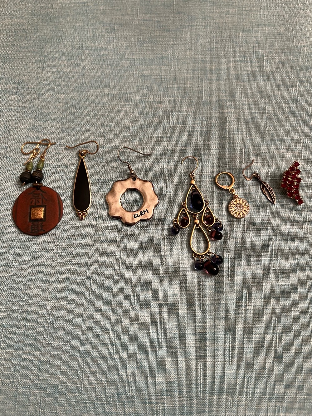 Lot of 7 single earrings including Laurel Burch and Clem